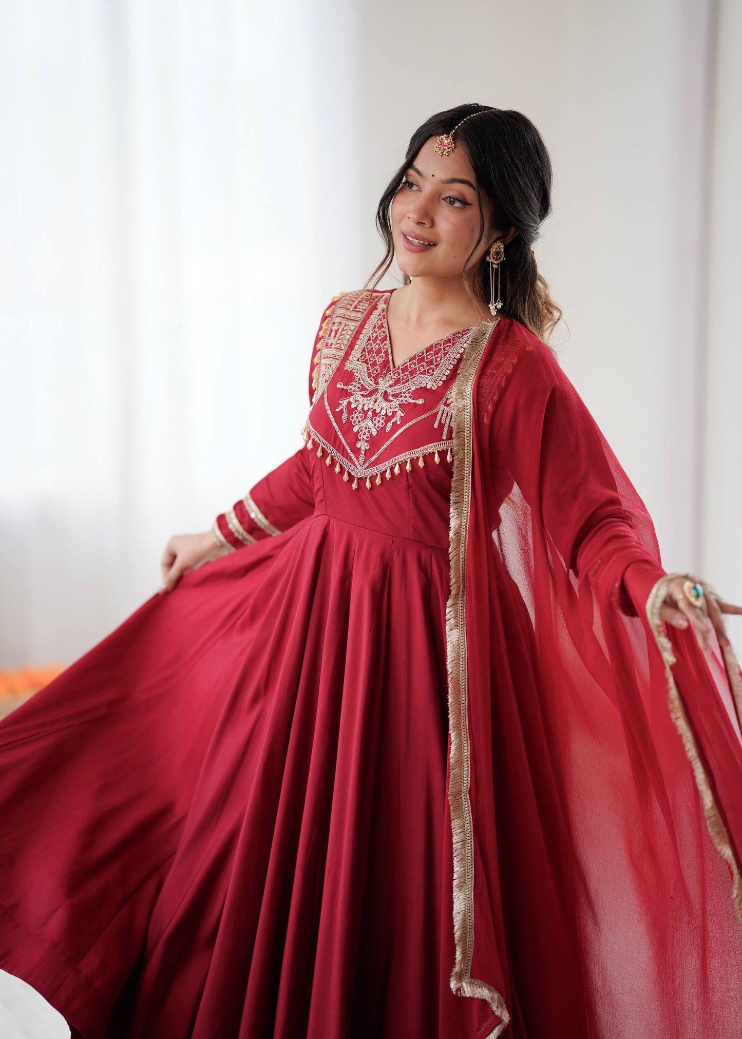 Maroon Majesty Handcrafted Elegance in Flowing Anarkali Suit