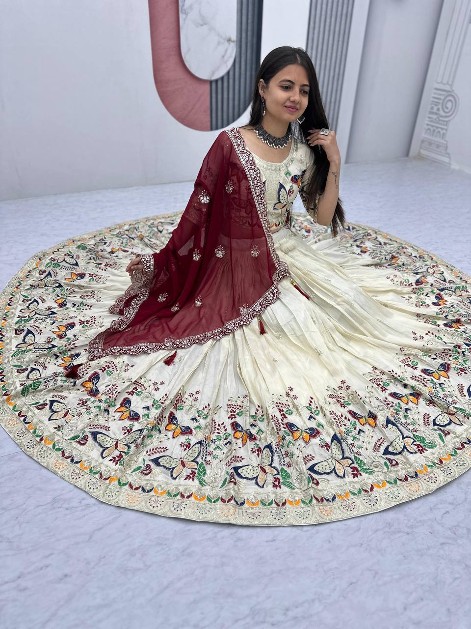 Butterfly Elegance: A Whimsical Cream & Maroon Lehenga Choli
