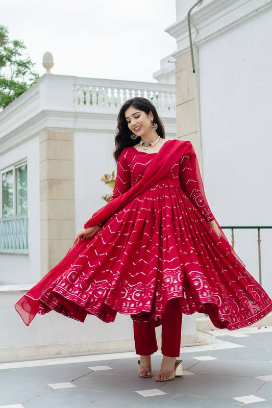 Grace in Every Twirl: Festive Red Magic Designer Anarkali Suit