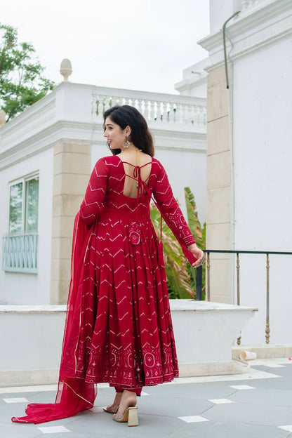 Grace in Every Twirl: Festive Red Magic Designer Anarkali Suit