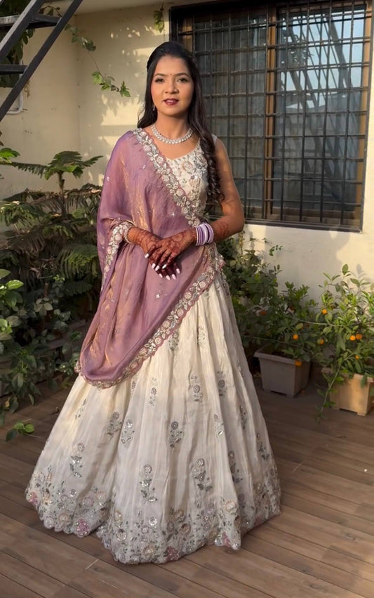 Kashvi’s Pastel Royalty White Bridal Lehenga with Sequin Floral Work