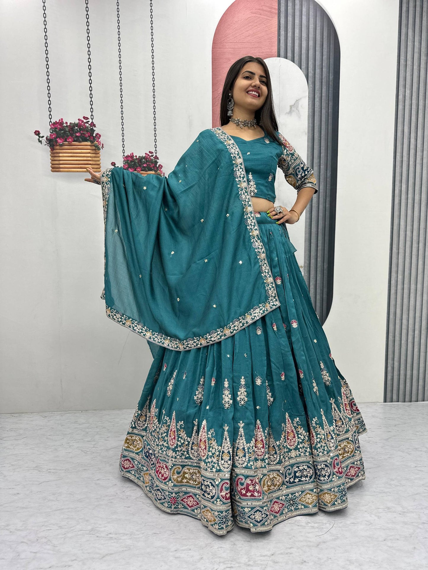 Palak Noor Teal Embroidered Lehenga Choli