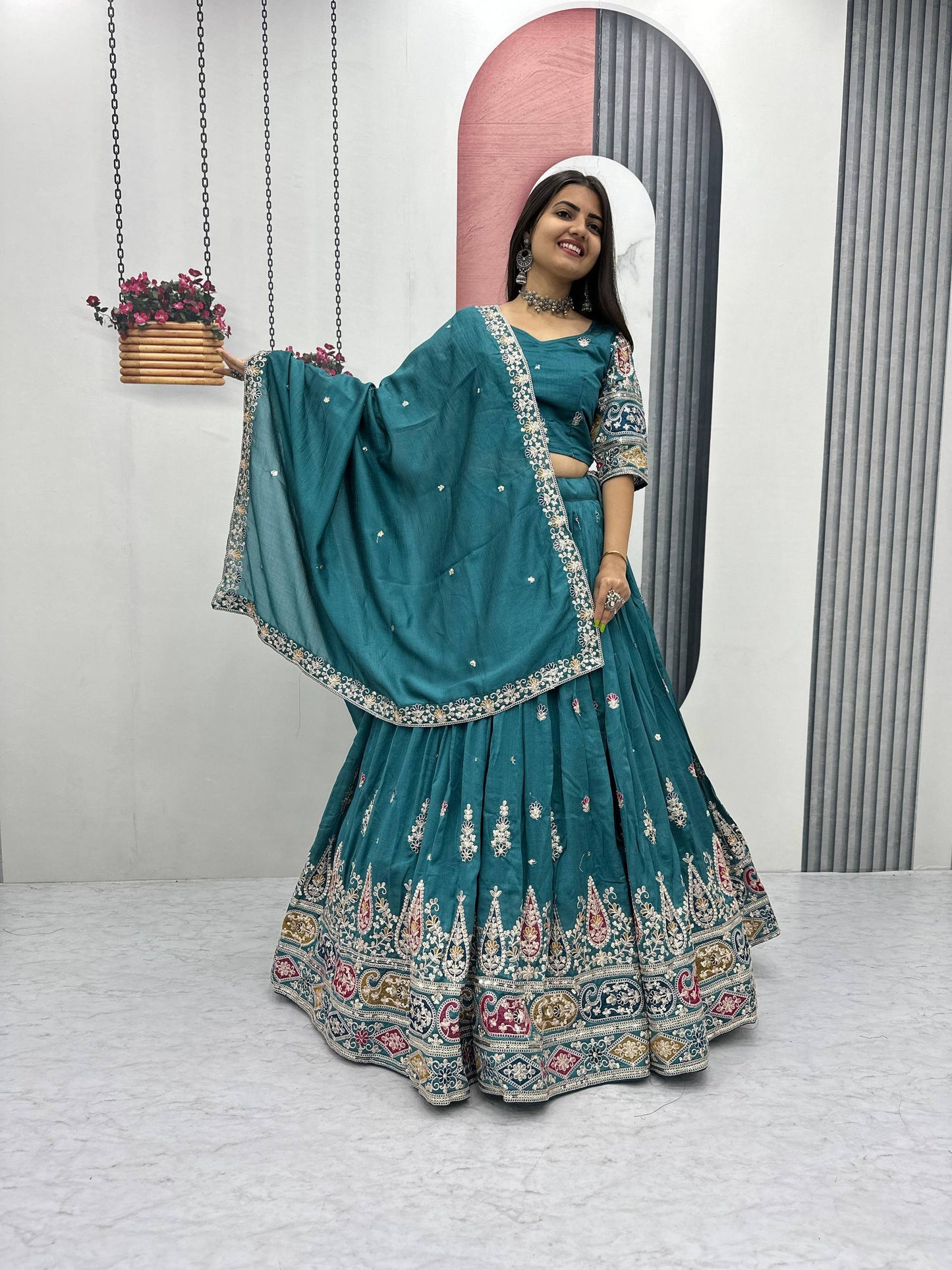 Palak Noor Teal Embroidered Lehenga Choli