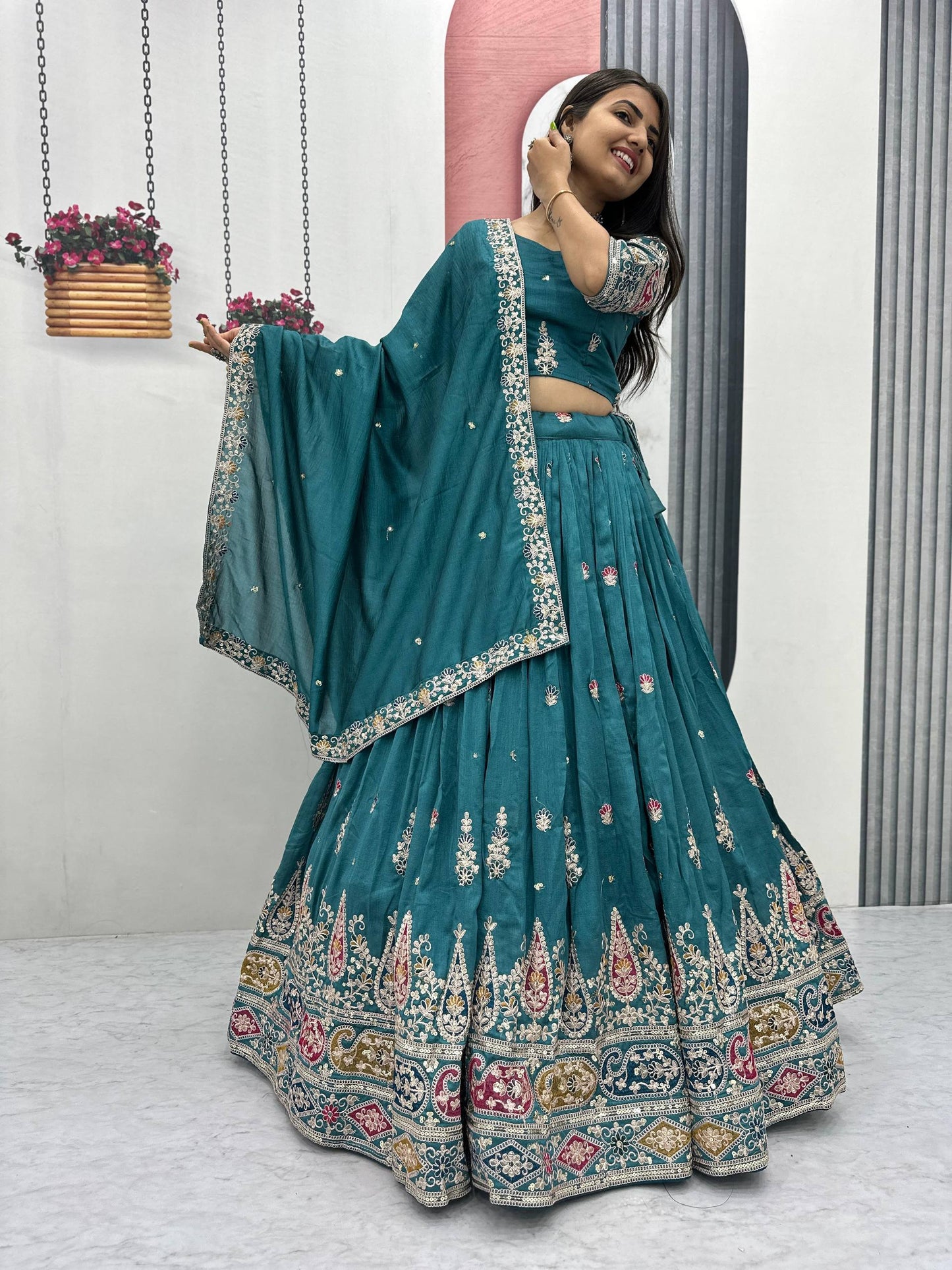 Palak Noor Teal Embroidered Lehenga Choli
